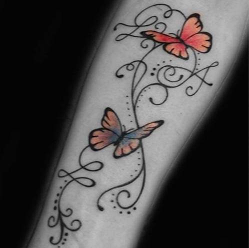 Tatouage Papillon sur Avant bras avec Arabesque - Rêve de Papillon