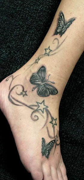 Tatouage Papillon et étoile sur Pied - Rêve de Papillon