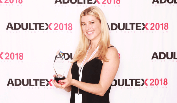 Alicia Sinclair accepts the Best New Product award for The Cowgirl Premium Sex Machine at Adultex