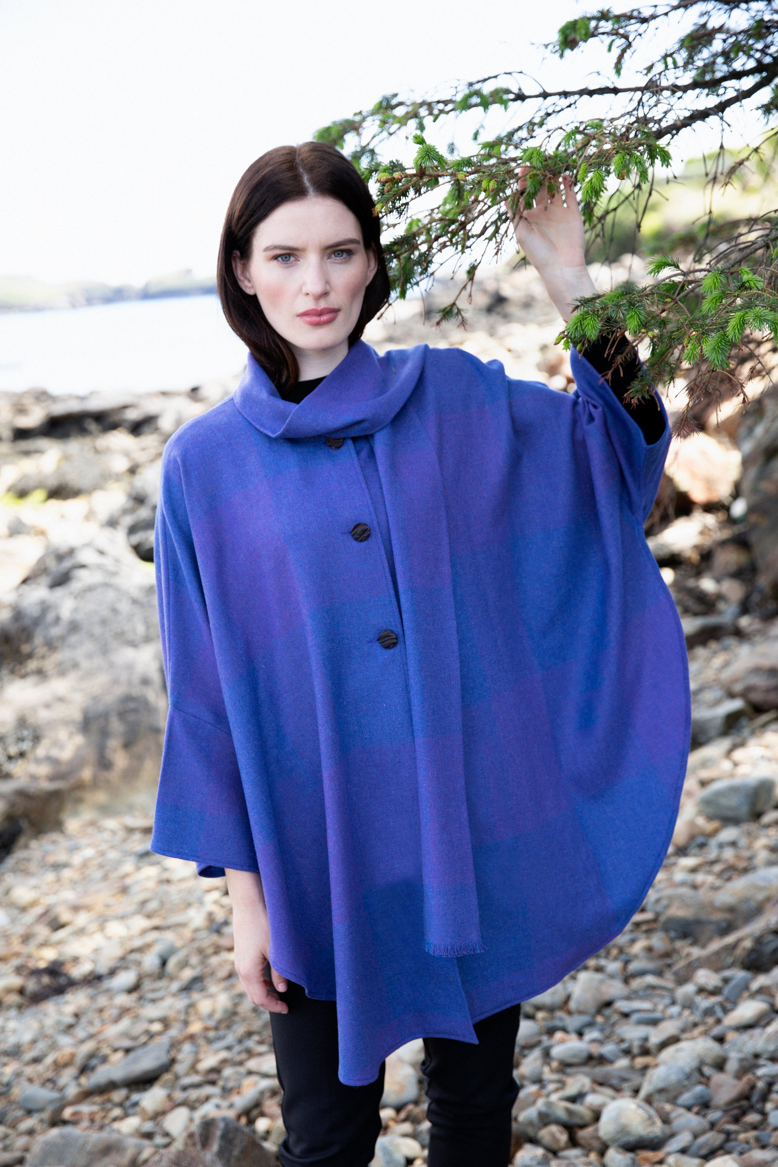 Model wearing Triona designed wool cape