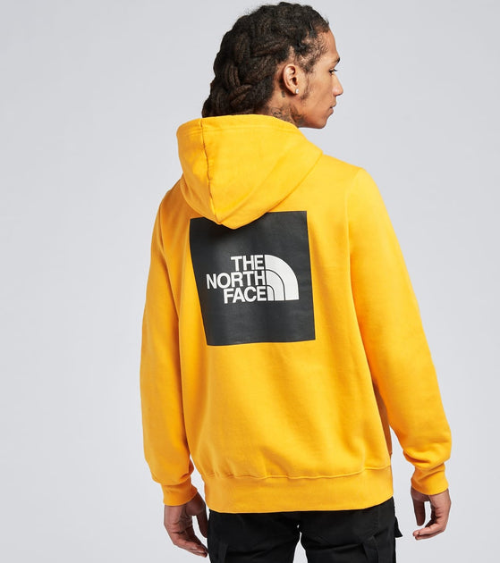 gold north face hoodie