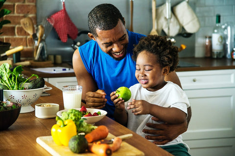 Father cooking with his son