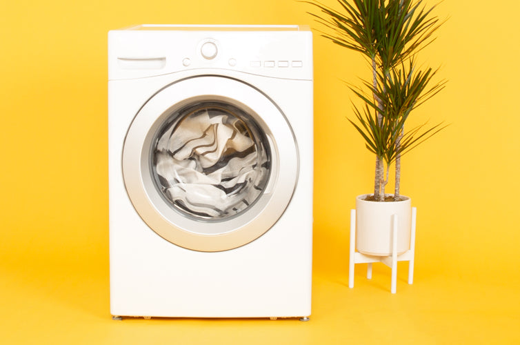 Washing Machine with Yellow Background