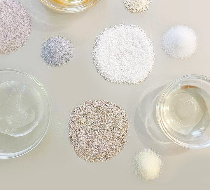 Ingredient powders and liquids on a countertop