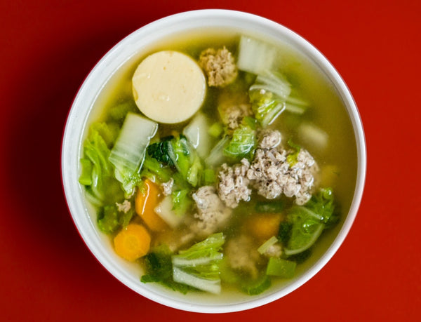 The complete guide to the AIP diet: a broth soup with vegetables and meat