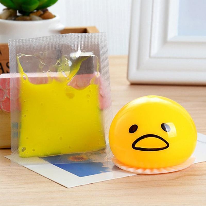 squishy puking egg yolk stress ball