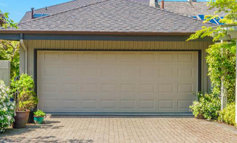 Large garage with a white door