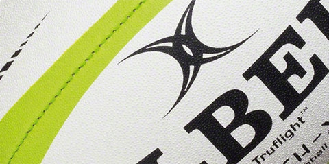a side image of a Gilbert rugby ball highlighting grip pimples