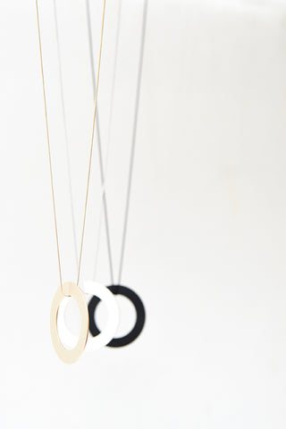 Image of two ring necklaces from the Pursuits collection