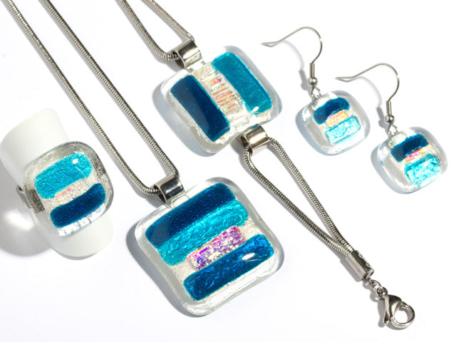 blue color fused glass jewel set with dichroic