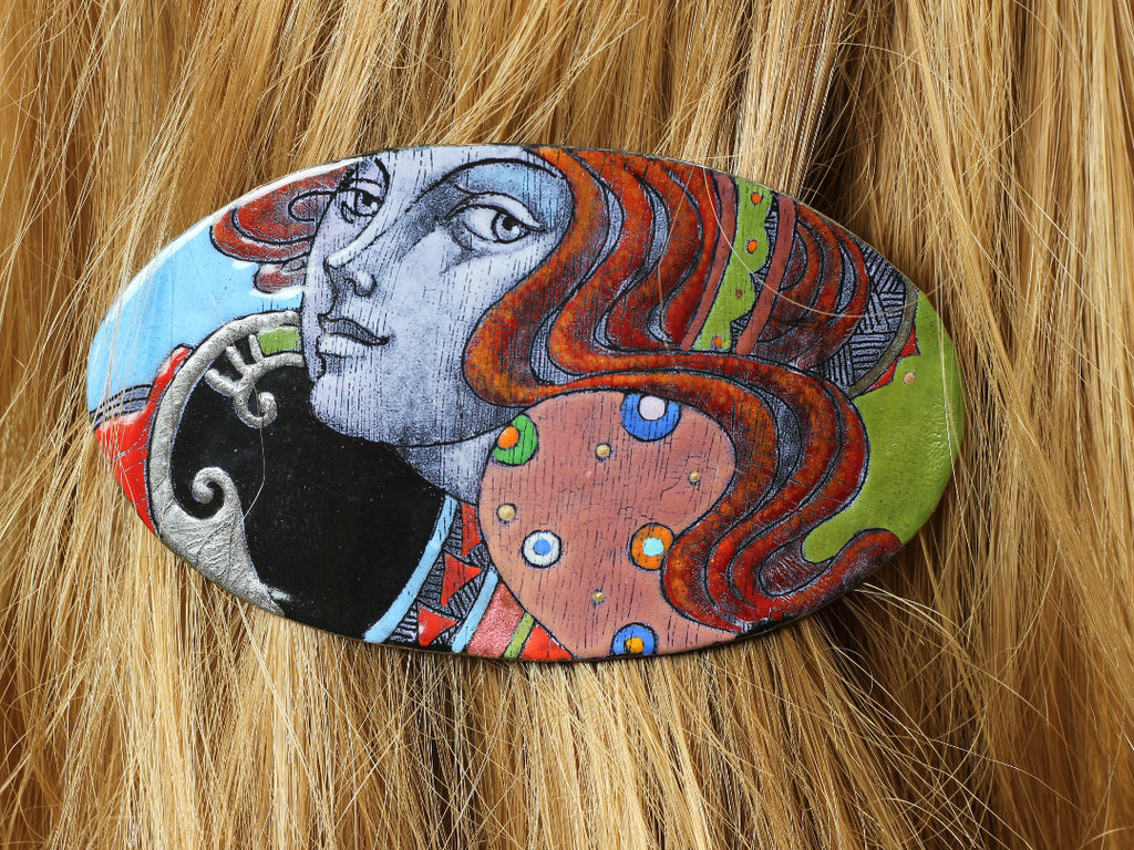 enamel hairgrips with faces for Christmas in Intuita