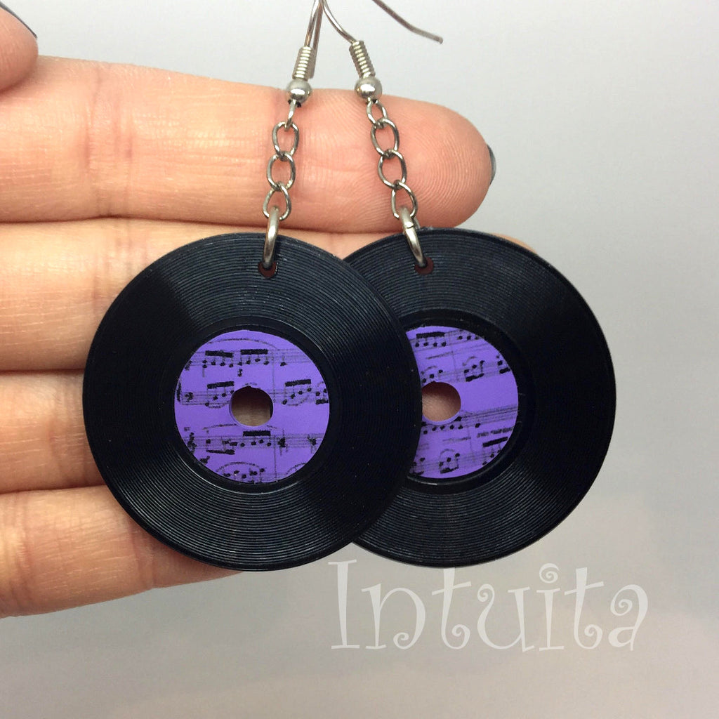 earrings that resemble old bakelite earrings with purple music notes