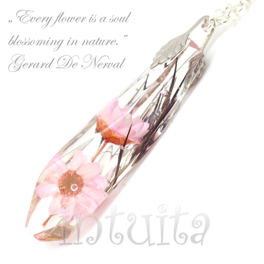 Pink color real flowers incased in resin pendant