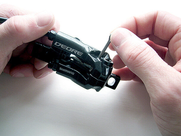 removing brake pas retaining pin shimano deore brake caliper