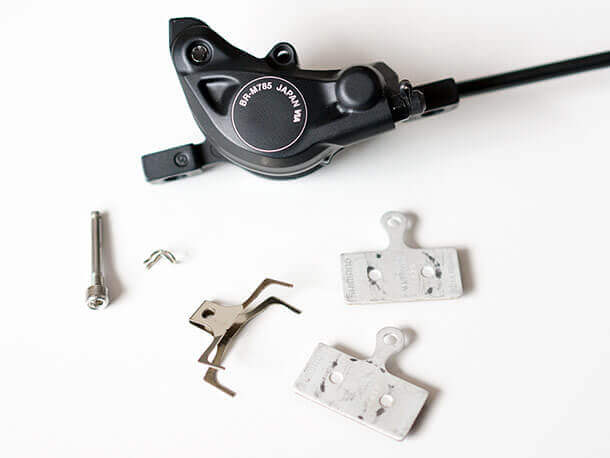 shimano deore brake calliper with brake pads removed components