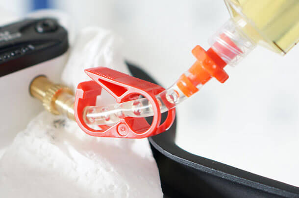bleeding air bubbles from quad master cylinder syringe tubing