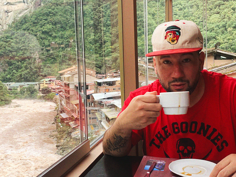 Photo of Eff Yoo sippin coffee somewhere's in Peru