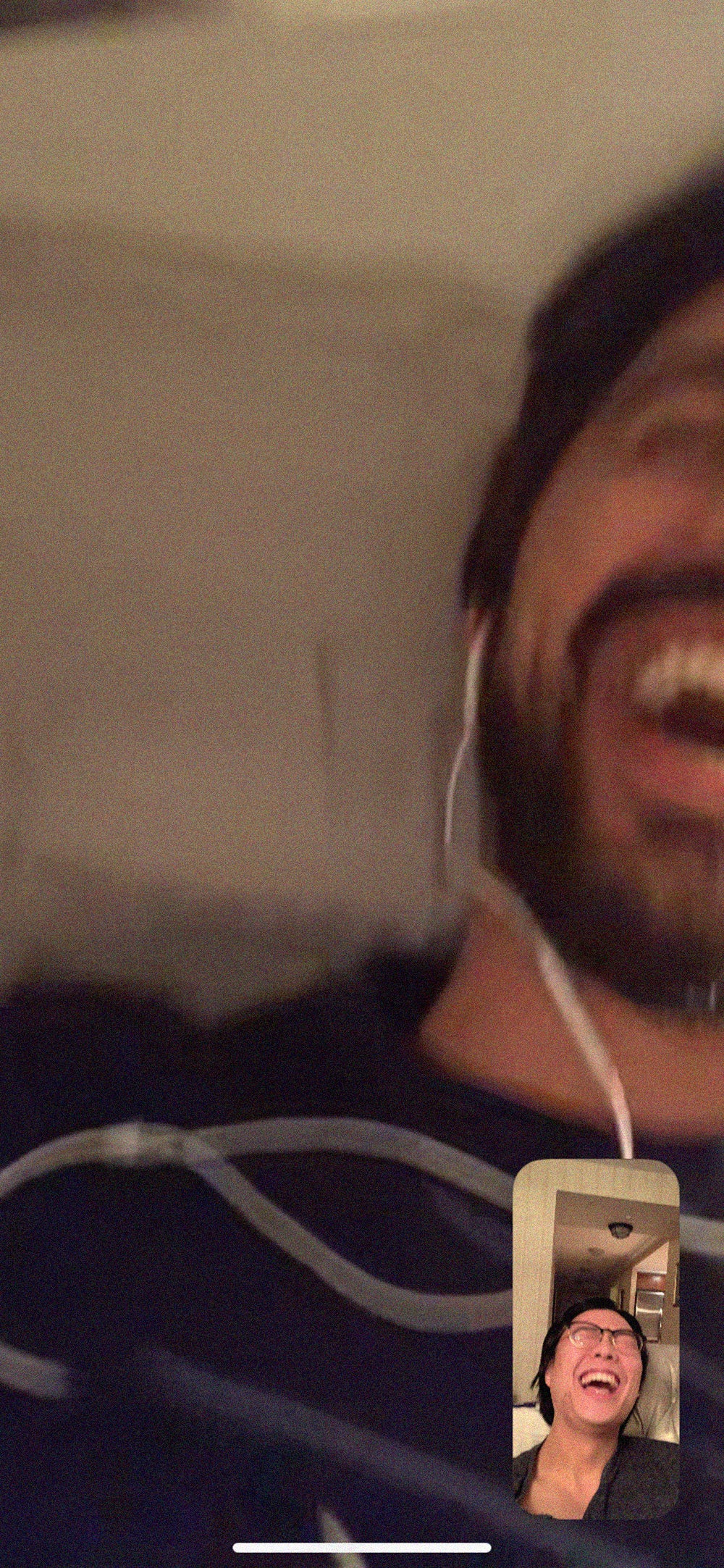 Screen cap 3 of Lawrence Le Lam laughing it up with friend on Facetime