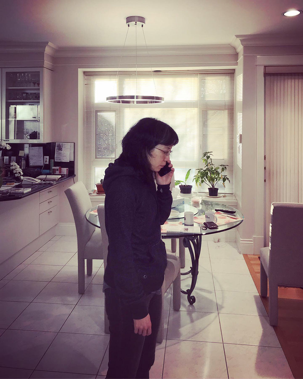 SPITGAN WEBZINE #3. Photo 7. Sis on the phone at home. Vancouver BC