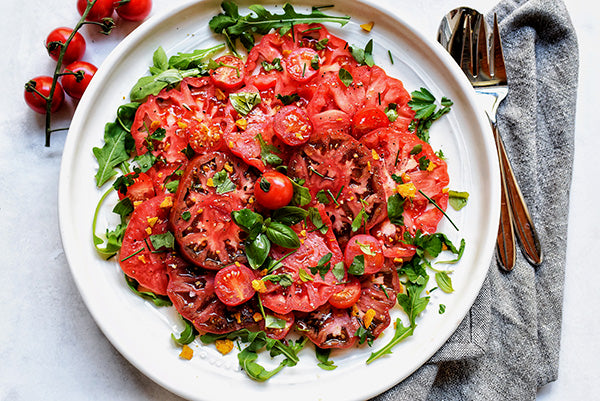 Rawcology Inc | Simple Herb Tomato and Olive Summer Salad