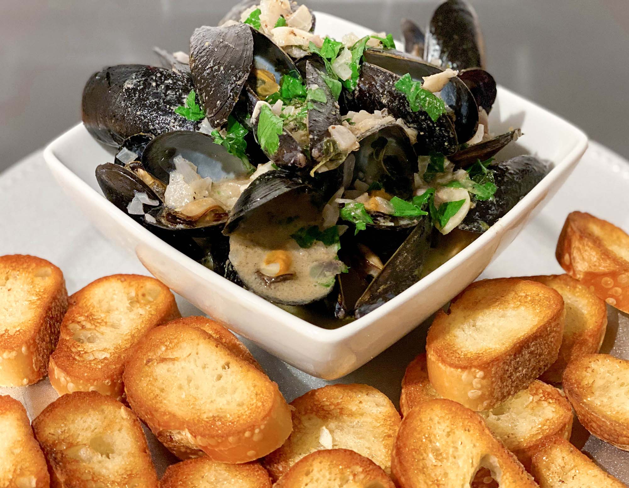 White Truffle Mussels in Wine Sauce made with White Truffle Sauce