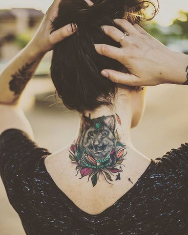 Tatouage Tête de Loup Femme