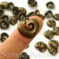 Tibetan Antique Bronze Whirling Heart Charm Pendant