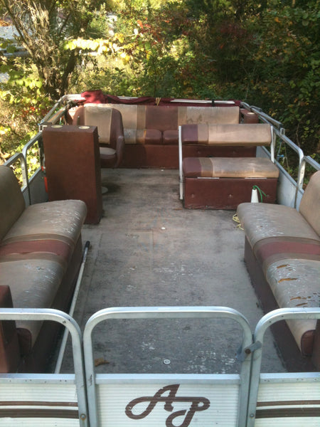 Used pontoon boat in need of new furniture and deck