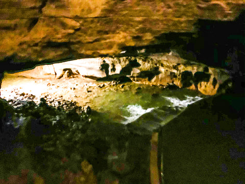 small waterfall inside bluespring caverns indiana
