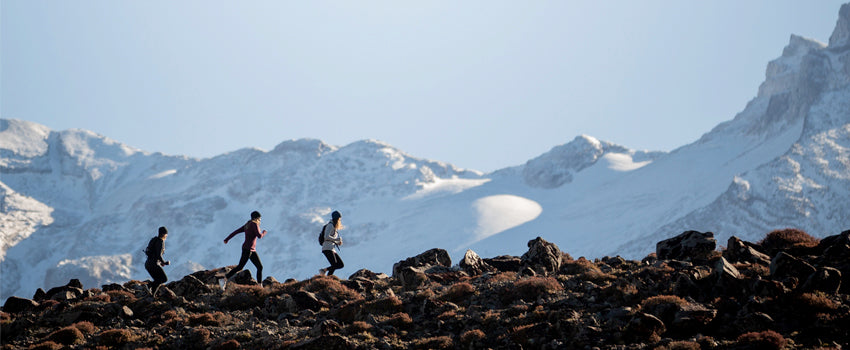 Girls Running Across Mountain In Opus Fresh New Zealand Merino Apparel