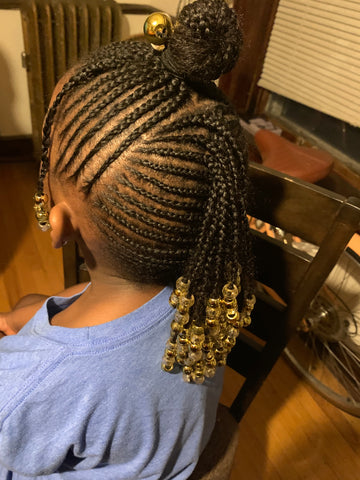 Small braids with beads were added...