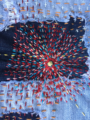 Mending with embroidery
