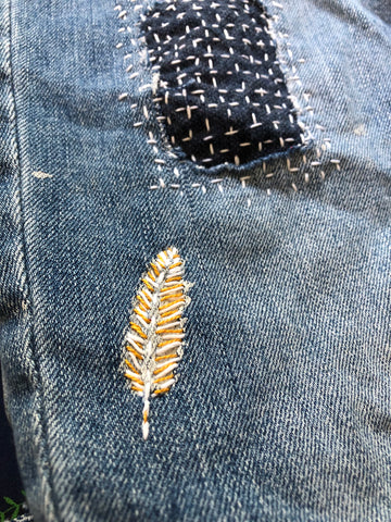 Embroidered Feather made from paint stain