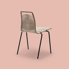 Carl Hansen and Son PK1 Chair by Poul Kjaerholm on Pink Background 