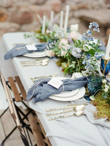 Blue wedding decor and place settings
