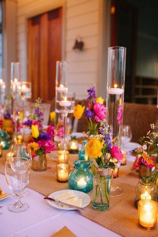Bright Floral Centerpieces and Floating Candles
