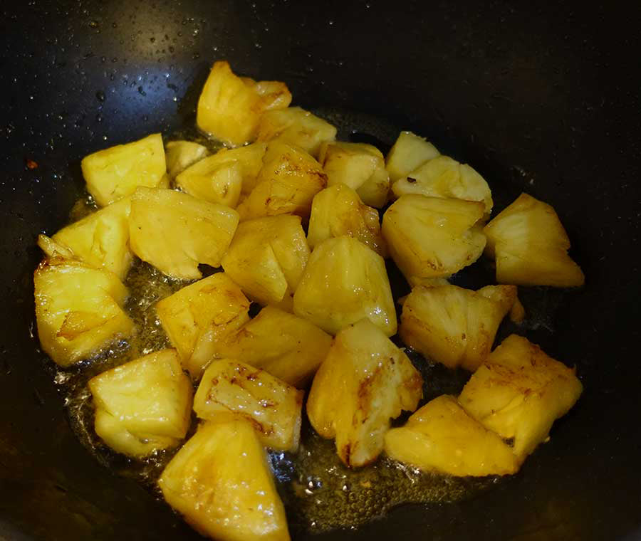 Saute pineapple in pan
