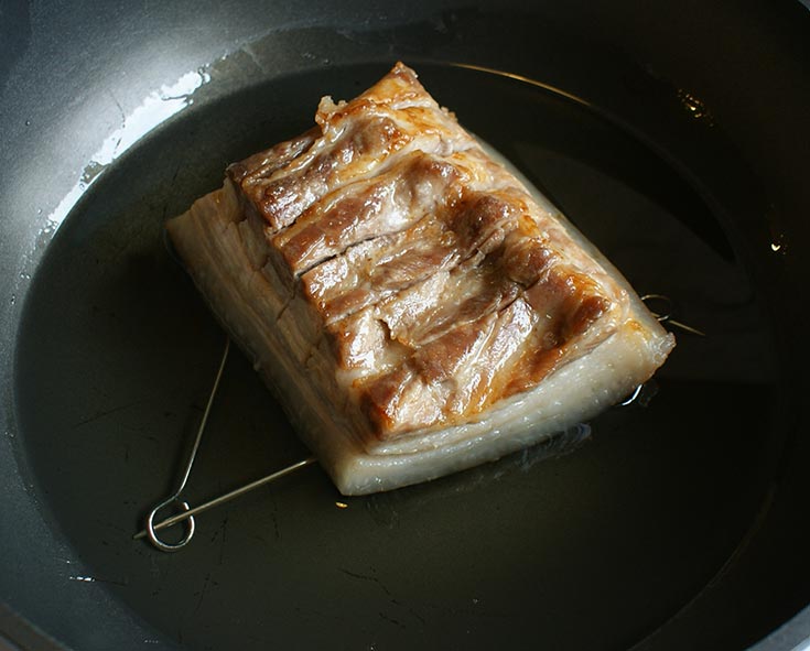 Crispy Pork Belly in Red Curry Paste Fry pork skin side down