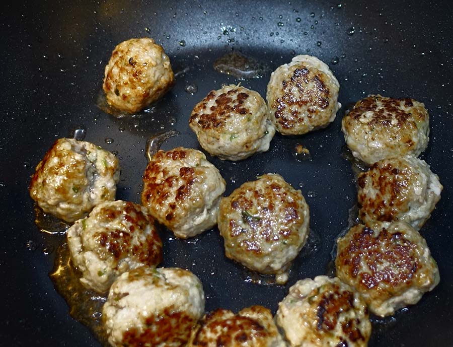 Fry meatballs until browned and then set aside