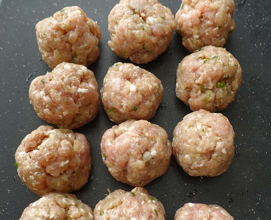 Use a spoon to roll the mixture to form meatballs