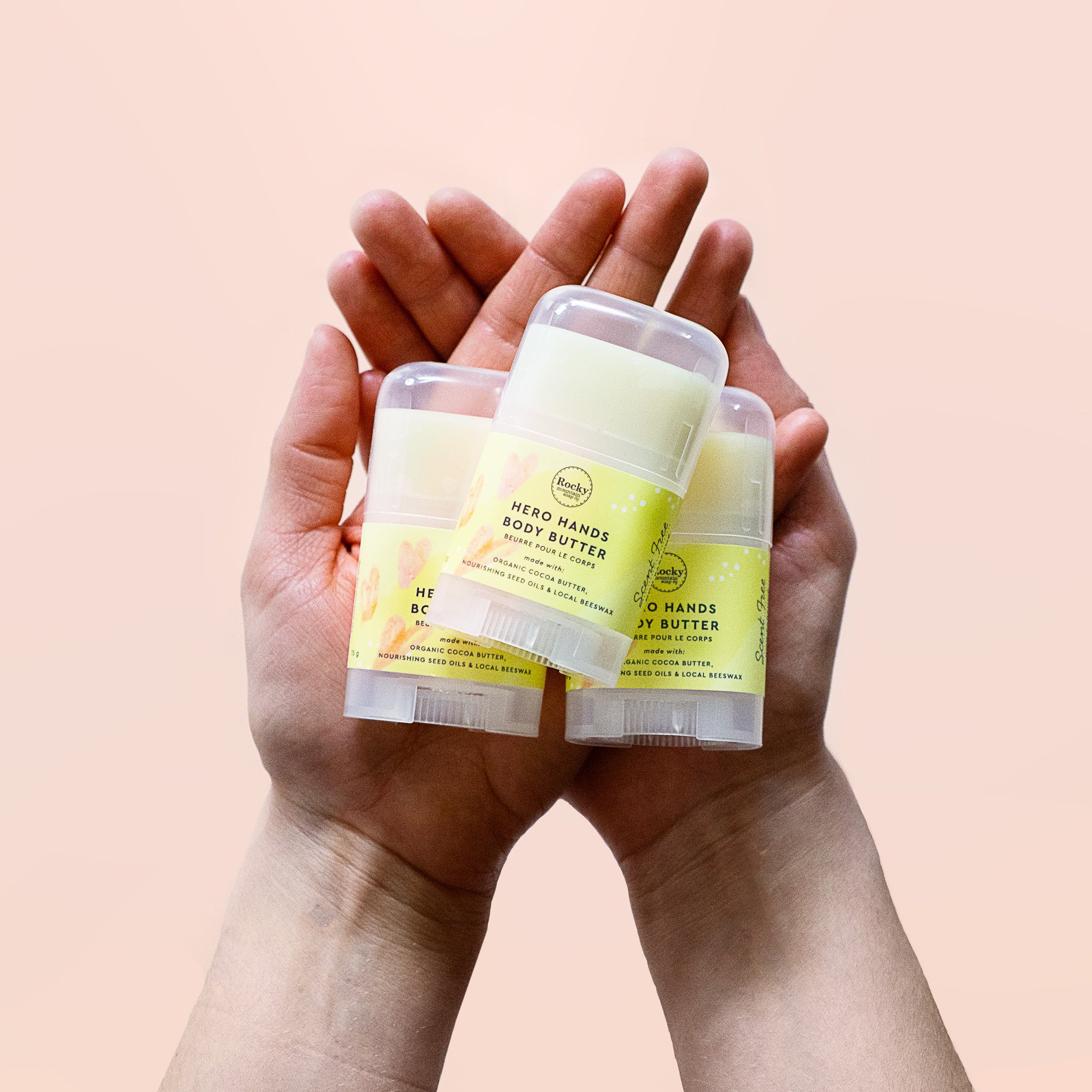 image of hands holding Hero Hands all natural dry skin butter 