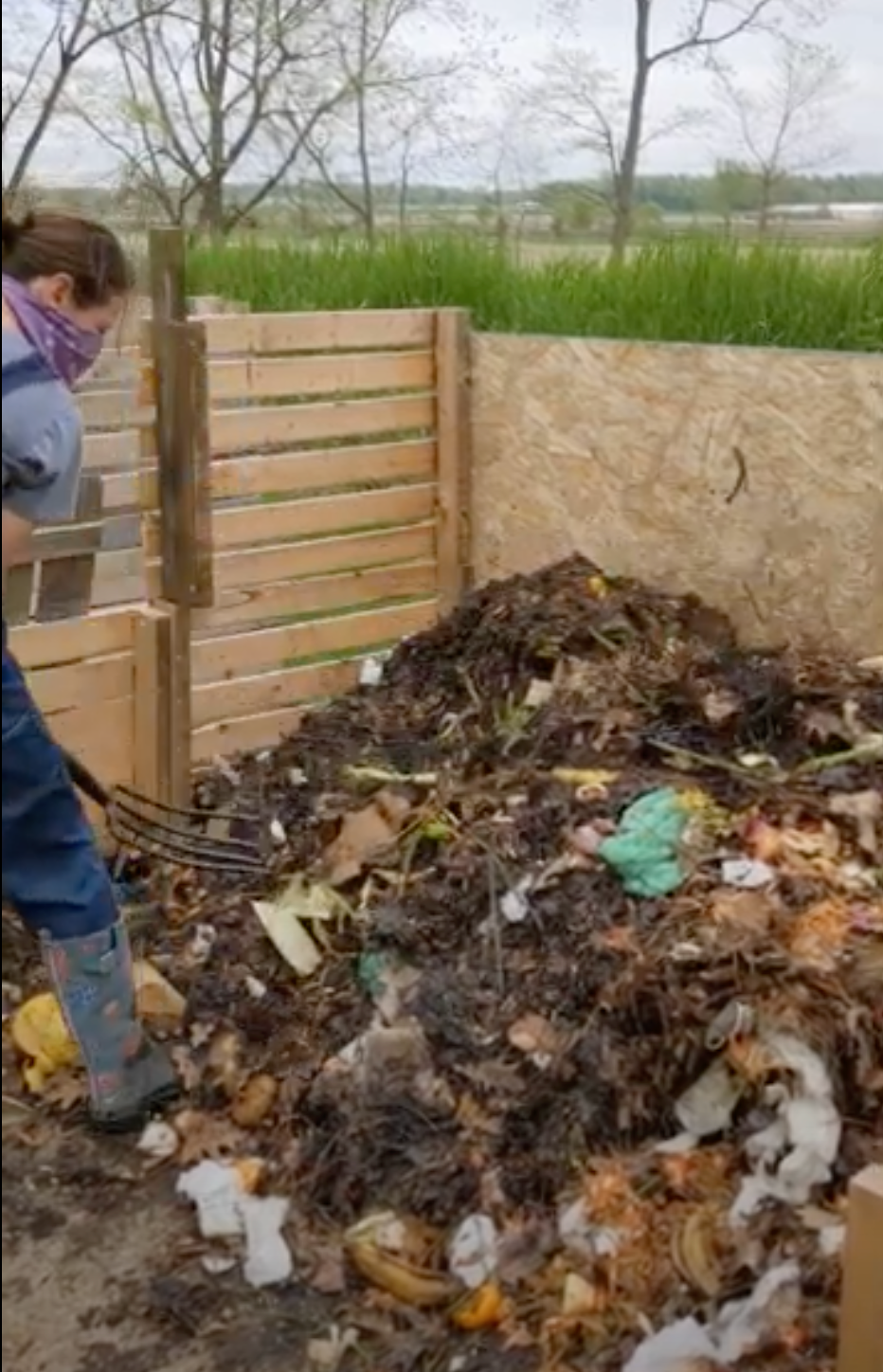 turning a compost pile 