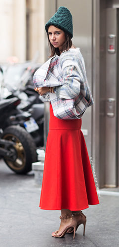 Natasha Goldenberg is seen wearing red jacket, Louis Vuitton bag