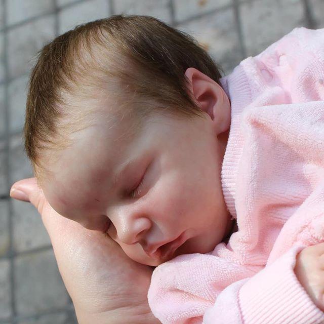 super realistic baby doll
