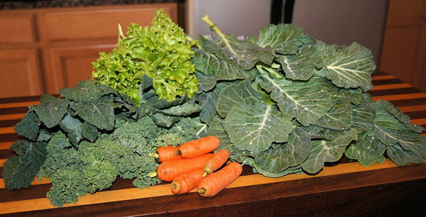 Pile of greens with carrots
