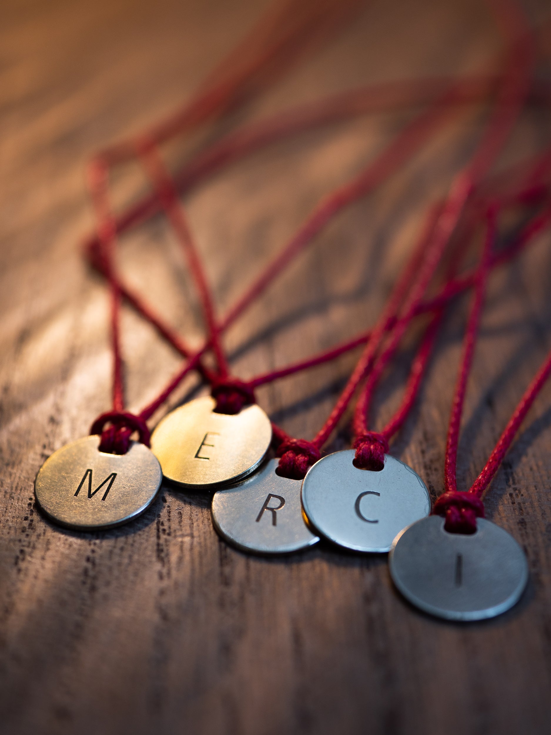 Médaille Merci lettre L