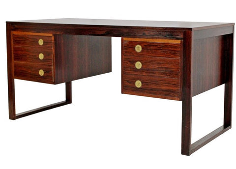 Dyrlund Rosewood Desk by Gunni Omman. Image from 1stdibs. 