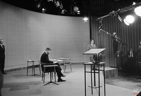 John F. Kennedy Seated in a Hans Wegner Round Chair