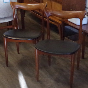 H.W. Klein teak dining chairs with original leatherette seats from Vintage Home Boutique