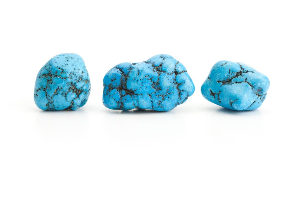 three turquoise stones